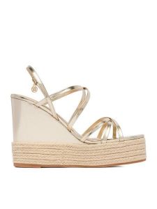 Nine West Sandały CEO-SW25-3 04 Złoty. Żółte sandały Nine West, bez wzorów, z materiału, bez obcasa, na koturnie, bez zapięcia. Za 229,99 zł.