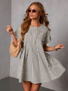 Milan Kiss Sukienka w kolorze beżowym rozmiar: XL. Brązowe sukienki Milan Kiss, xl, bez wzorów, z bawełny, bez kołnierzyka, bez ramiączek, mini. Za 173,99 zł.