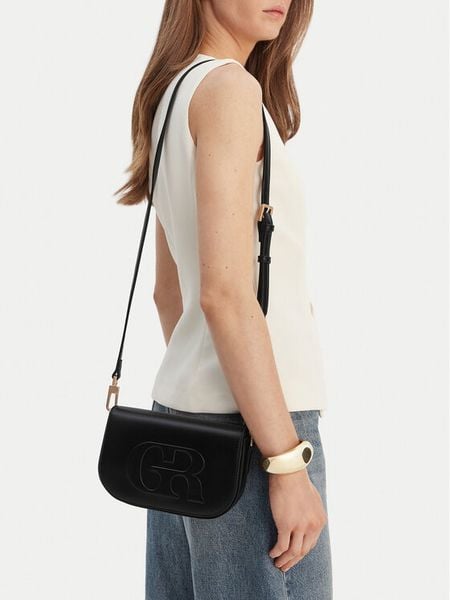 GINO ROSSI Torebka C-KY191 Czarny. Czarne listonoszki Gino Rossi, bez wzorów, z materiału, bez dodatków. Za 179,99 zł.