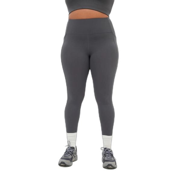 Legginsy wysoka talia 7/8 z kieszenią dla kobiet Girlfriend Collective. Czarne legginsy GIRLFRIEND COLLECTIVE, bez wzorów, z materiału, z podwyższonym stanem. Za 279,99 zł.