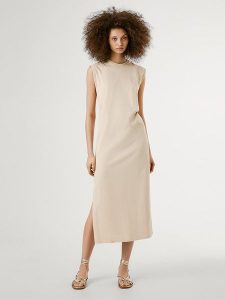 Pepe Jeans Sukienka "Ari" w kolorze beżowym rozmiar: S. Brązowe sukienki Pepe Jeans, na co dzień, s, bez wzorów, z bawełny, bez kołnierzyka, bez ramiączek, maxi, proste. Za 171,28 zł.