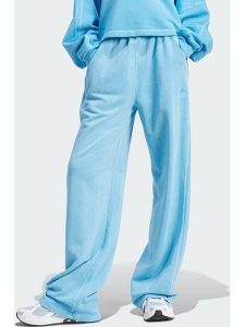 Adidas Spodnie dresowe "ESS+" w kolorze niebieskim rozmiar: M. Niebieskie spodnie dresowe ADIDAS, m, bez wzorów, z bawełny. Za 126,95 zł.