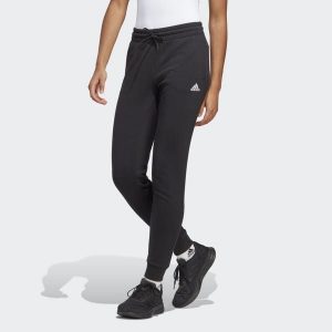 Spodnie dresowe adidas Essentials Linear French Terry Cuffed. Białe spodnie dresowe ADIDAS, s, bez wzorów, z dresówki. Za 199,00 zł.