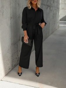 Milan Kiss Kombinezon w kolorze czarnym rozmiar: L. Czarne kombinezony Milan Kiss, l, bez wzorów, z tkaniny, bez kołnierzyka, bez ramiączek. Za 173,99 zł.