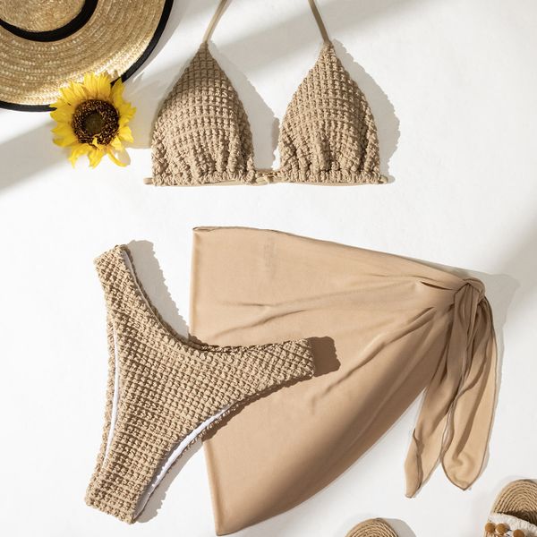 Strój kąpielowy z pareo z miękkiej tkaniny na lato Austina. Brązowe stroje jednoczęściowe Intica, bez wzorów, z tkaniny. Za 149,00 zł.