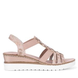 Sandały Rieker. Żółte sandały Rieker, bez wzorów, bez obcasa, na koturnie, bez zapięcia. Za 339,99 zł.