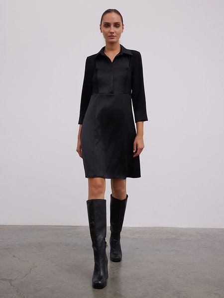 BGN Sukienka w kolorze czarnym rozmiar: 40. Czarne sukienki BGN, na co dzień, bez wzorów, z tkaniny, bez kołnierzyka, bez ramiączek, midi, proste. Za 121,99 zł.