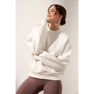 Bluza do jogi Moonholi Just Perfect oversize z bawełnianej dzianiny. Białe bluzy MOONHOLI, m, bez wzorów, z bawełny, bez kaptura. Za 329,00 zł.