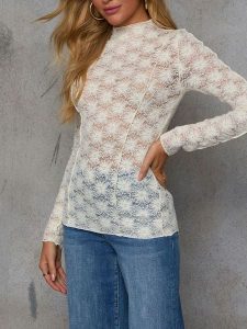 Milan Kiss Bluzka w kolorze kremowym rozmiar: S. Brązowe bluzki Milan Kiss, s, bez wzorów, z koronki, bez kołnierzyka, bez ramiączek. Za 104,99 zł.