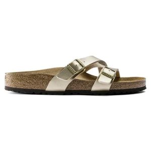 BIRKENSTOCK Yao Balance BF Gold Klapki damskie. Żółte klapki Birkenstock, bez wzorów, ze skóry, bez obcasa. Za 299,99 zł.