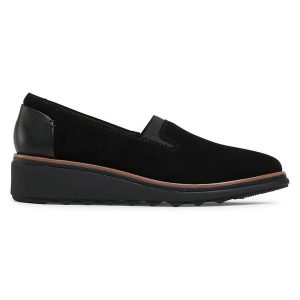 Półbuty Clarks. Czarne czółenka Clarks, bez wzorów, bez obcasa, na koturnie, bez zapięcia. Za 399,99 zł.