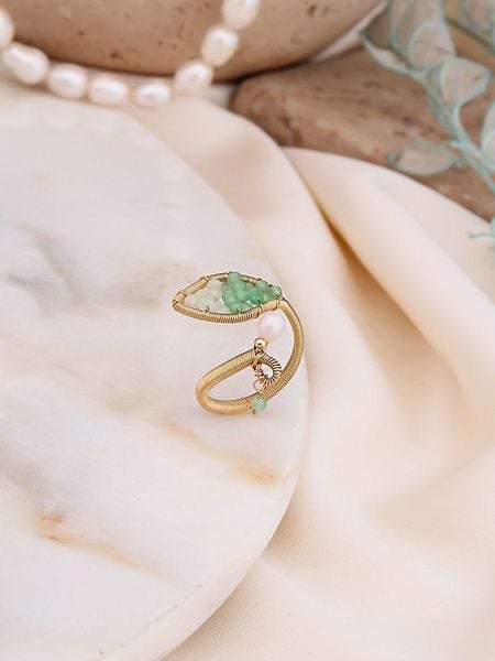 Pierres de Jade Pozłacany pierścionek z perłą i kryształami rozmiar: onesize. Białe pierścionki Pierres de Jade, z kryształem, pozłacane. Za 66,47 zł.