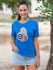 Isla Bonita by SIGRIS Koszulka w kolorze niebieskim rozmiar: L. Niebieskie bluzki Isla Bonita by SIGRIS, l, bez wzorów, z bawełny, bez kołnierzyka, bez ramiączek. Za 83,42 zł.