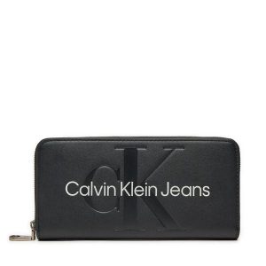 Portfel Calvin Klein Jeans. Czarne portfele Calvin Klein Jeans, bez wzorów, z jeansu. Za 219,99 zł.