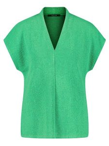 Gerry Weber Koszulka w kolorze zielonym rozmiar: 38. Zielone bluzki Gerry Weber, bez wzorów, bez kołnierzyka, bez ramiączek. Za 92,21 zł.