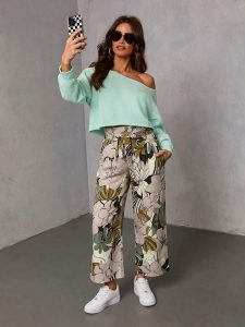 Milan Kiss Spodnie ze wzorem rozmiar: S. Spodnie z wysokim stanem Milan Kiss, bez wzorów, z materiału, z podwyższonym stanem. Za 152,99 zł.