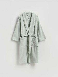 Bawełniany szlafrok - jasnozielony. Zielone szlafroki Reserved, l, bez wzorów, z bawełny, bez kaptura. Za 159,99 zł.