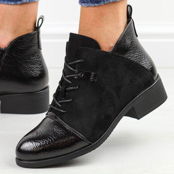 Czarne płaskie botki damskie M.Daszyński 2458-7. Czarne botki M.Daszyński, na jesień, bez wzorów, z polaru, bez obcasa, na obcasie, bez zapięcia. Za 189,00 zł.