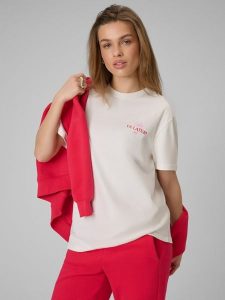 4F T-shirt loose z nadrukiem damski - beżowy M. Brązowe t-shirty 4f, m, bez wzorów, z bawełny, bez kołnierzyka, bez ramiączek. Za 69,99 zł.
