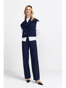 Rich & Royal Spodnie w kolorze granatowym rozmiar: 42. Niebieskie spodnie z wysokim stanem Rich & Royal, bez wzorów, z materiału, z podwyższonym stanem. Za 208,99 zł.