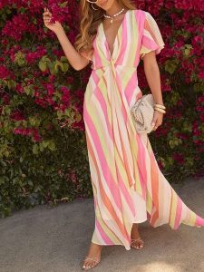 Milan Kiss Sukienka w kolorze kremowo-różowym ze wzorem rozmiar: L. Brązowe sukienki Milan Kiss, l, bez wzorów, bez kołnierzyka, bez ramiączek, maxi. Za 184,89 zł.