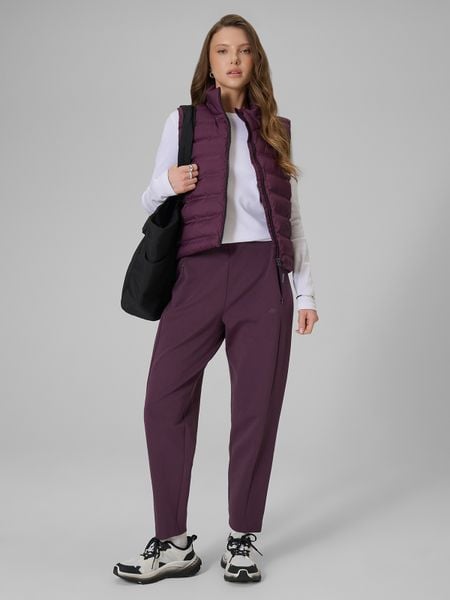 4F Spodnie dresowe damskie - fioletowe XL. Fioletowe spodnie dresowe 4f, xl, bez wzorów, z dresówki. Za 159,99 zł.