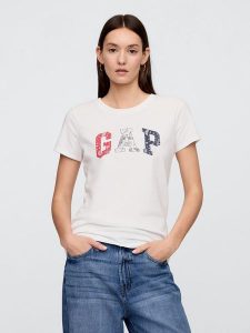 GAP Koszulka w kolorze kremowym rozmiar: XL. Brązowe bluzki GAP, xl, bez wzorów, z bawełny, bez kołnierzyka, bez ramiączek. Za 74,63 zł.
