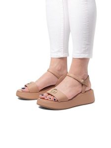 U.S. Polo Assn. Sandały w kolorze jasnobrązowym na koturnie rozmiar: 41. Brązowe sandały U.S. Polo Assn., bez wzorów, z otwartym noskiem, bez obcasa, na koturnie, bez zapięcia. Za 217,99 zł.