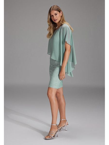 SWING Sukienka w kolorze miętowym rozmiar: 44. Zielone sukienki Swing, bez wzorów, bez kołnierzyka, bez ramiączek, mini. Za 205,45 zł.