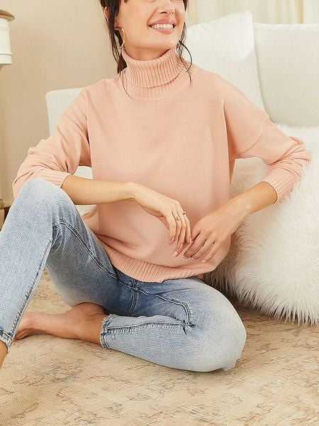 Milan Kiss Golf w kolorze łososiowym rozmiar: S. Pomarańczowe golfy Milan Kiss, bez wzorów. Za 143,90 zł.