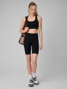 Legginsy do biegania krótkie damskie z wysokim stanem bezszwowe. Fioletowe legginsy 4f, bez wzorów, z dzianiny, z podwyższonym stanem, krótkie. Za 99,99 zł.