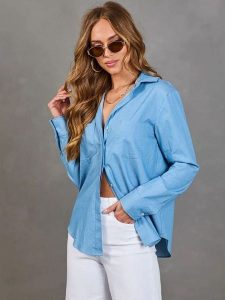 LA Angels Koszula w kolorze błękitnym rozmiar: M. Niebieskie koszule LA Angels, m, bez wzorów, z bawełny, bez kołnierzyka, bez ramiączek. Za 204,95 zł.