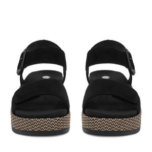 Sandały Remonte. Czarne sandały Remonte, bez wzorów, bez obcasa, na koturnie, bez zapięcia. Za 379,99 zł.