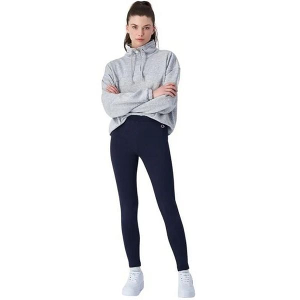 Legginsy Damskie 117567 BS501. Czarne legginsy Champion, bez wzorów, z bawełny, z podwyższonym stanem, długie. Za 119,00 zł.