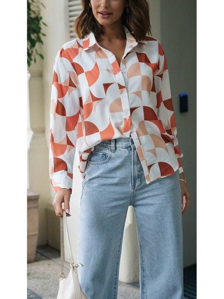 Milan Kiss Bluzka w kolorze biało-pomarańczowym rozmiar: L. Białe bluzki Milan Kiss, l, bez wzorów, z wiskozy, bez kołnierzyka, bez ramiączek. Za 130,81 zł.