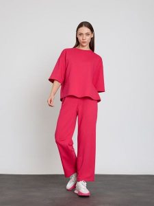 BGN Koszulka w kolorze różowym rozmiar: 38. Różowe bluzki BGN, bez wzorów, z bawełny, bez kołnierzyka, bez ramiączek. Za 65,99 zł.