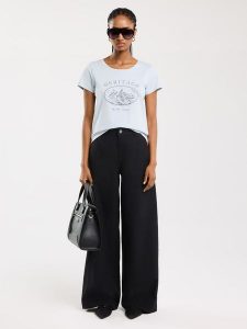 BIG STAR Koszulka w kolorze błękitnym rozmiar: L. Niebieskie bluzki Big Star, l, bez wzorów, z bawełny, retro, bez kołnierzyka, bez ramiączek. Za 27,99 zł.