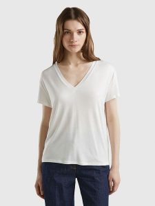 Benetton Koszulka w kolorze białym rozmiar: M. Białe bluzki Benetton, m, bez wzorów, bez kołnierzyka, bez ramiączek. Za 65,85 zł.