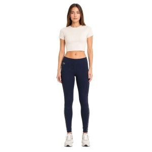 Spodnie damskie Lacoste sportowe treningowe legginsy granatowe. Niebieskie legginsy Lacoste, bez wzorów, z elastanu. Za 357,00 zł.