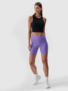 4F Legginsy krótkie damskie - fioletowe S. Fioletowe legginsy 4f, bez wzorów, z dzianiny, z podwyższonym stanem, krótkie. Za 59,99 zł.