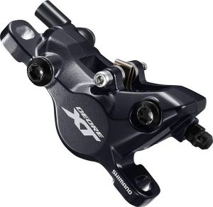 Hydrauliczny zacisk hamulca tarczowego 2-pistons typ drążka Shimano Deore XT BR-. Czarne balerinki Shimano, bez wzorów, z materiału, bez obcasa, bez zapięcia. Za 354,00 zł.