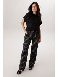 Aniston Spodnie w kolorze czarno-białym rozmiar: 36. Czarne spodnie z wysokim stanem Aniston, bez wzorów, z materiału, z podwyższonym stanem. Za 130,99 zł.