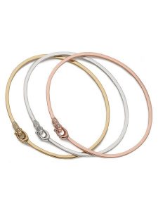 Coach Zestaw bransoletek 37335756TRI973 Złoty. Żółte bransoletki Coach, metalowe. Za 369,99 zł.