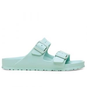 Klapki damskie Birkenstock Arizona Eva. Niebieskie klapki Birkenstock, bez wzorów, z materiału, bez obcasa. Za 344,00 zł.