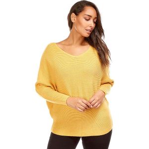 Sweter w kolorze żółtym. Żółte swetry oversize marki Cashmere Curve, z kaszmiru. W wyprzedaży za 129,95 zł.