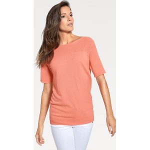 Sweter w kolorze brzoskwiniowym. Swetry oversize marki Ashley Brooke by Heine. W wyprzedaży za 173,95 zł.