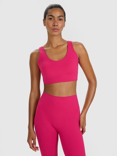4F Biustonosz treningowy ze średnim wsparciem - różowy M. Czerwone biustonosze 4f, bez wzorów, z elastanu. W wyprzedaży za 99,99 zł.