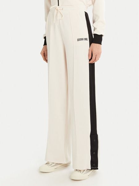 Guess Spodnie dresowe V5RB00 KCO72 Écru Regular Fit. Spodnie dresowe Guess, m, z aplikacjami, z dresówki. Za 209,99 zł.