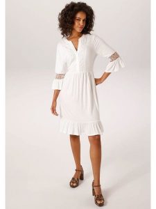 Aniston Sukienka w kolorze białym rozmiar: 42. Białe sukienki Aniston, bez wzorów, z koronki, bez kołnierzyka, bez ramiączek, midi. Za 173,99 zł.