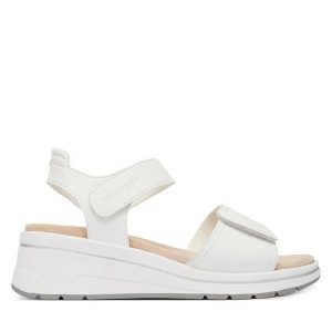 Sandały Caprice. Białe sandały Caprice, bez wzorów, bez obcasa, na koturnie, bez zapięcia. Za 329,99 zł.